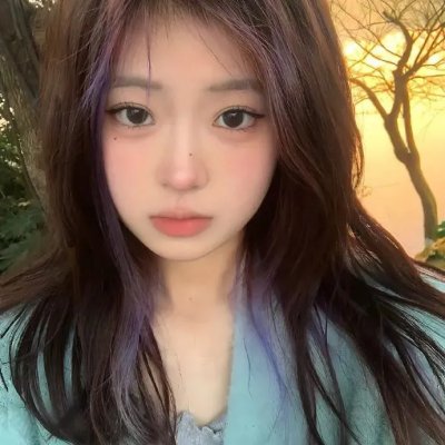 照片的她